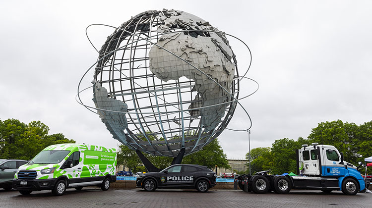 Electric fleet vehicles on display at the 2024 fleet show.