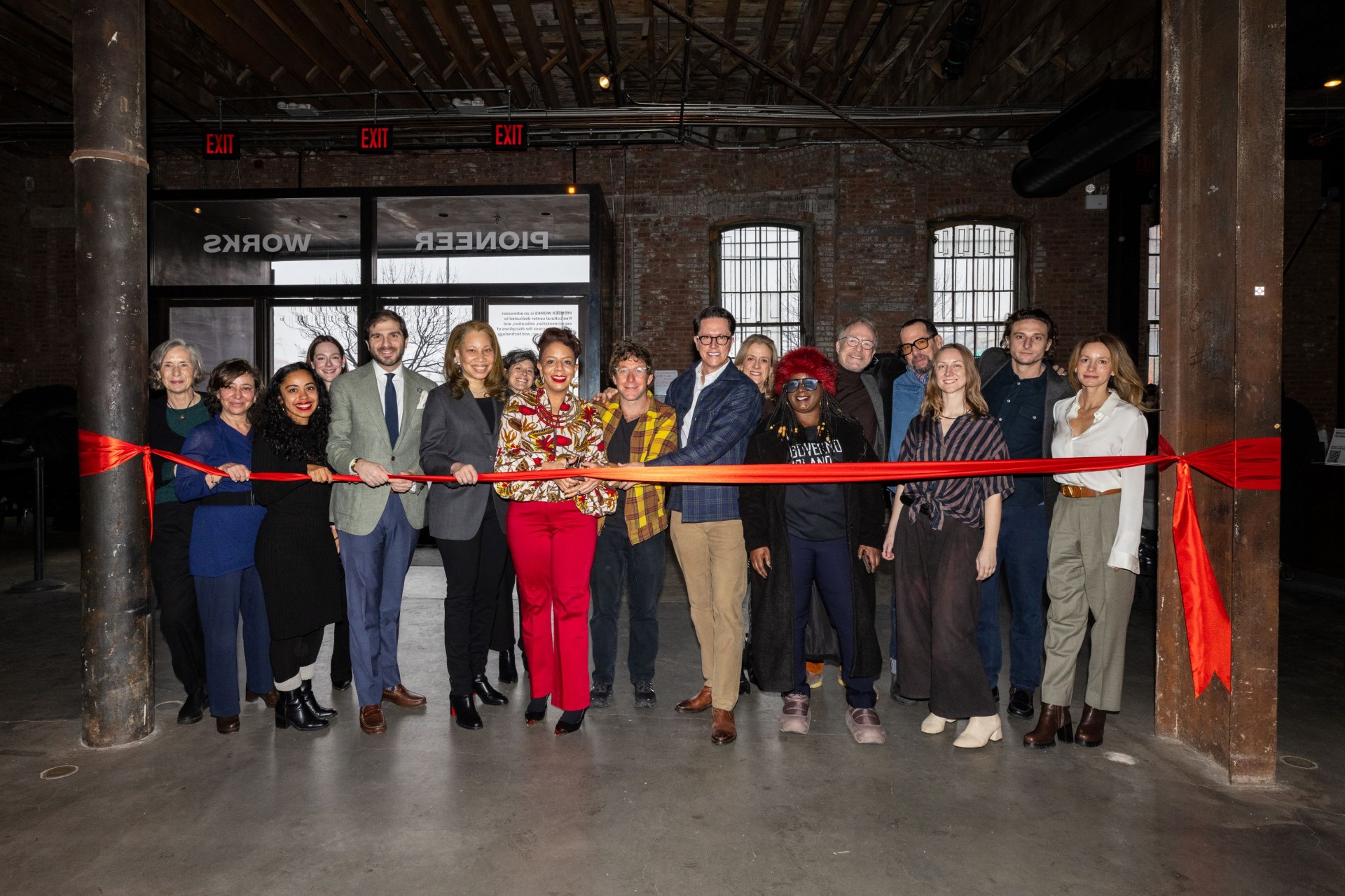 Group photo of the ribbon cutting at Pioneer Works