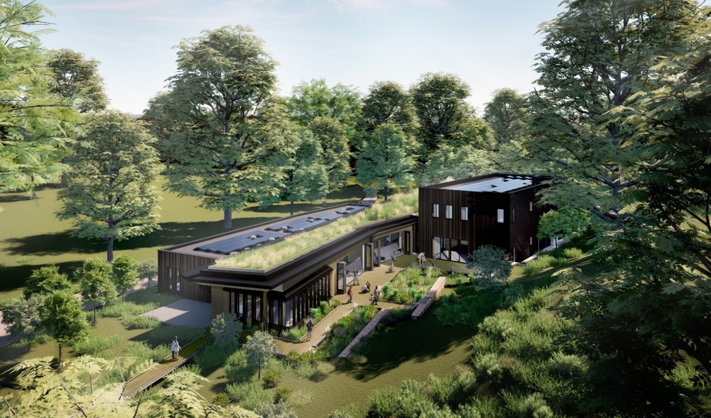A bird's eye view rendering of the QBG education building surrounded by trees. 