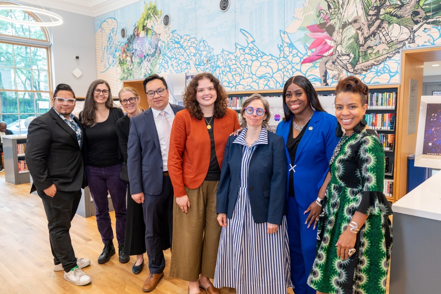 A photo with the artists, Commissioner Cumbo, and the Borough President Gibson. 
