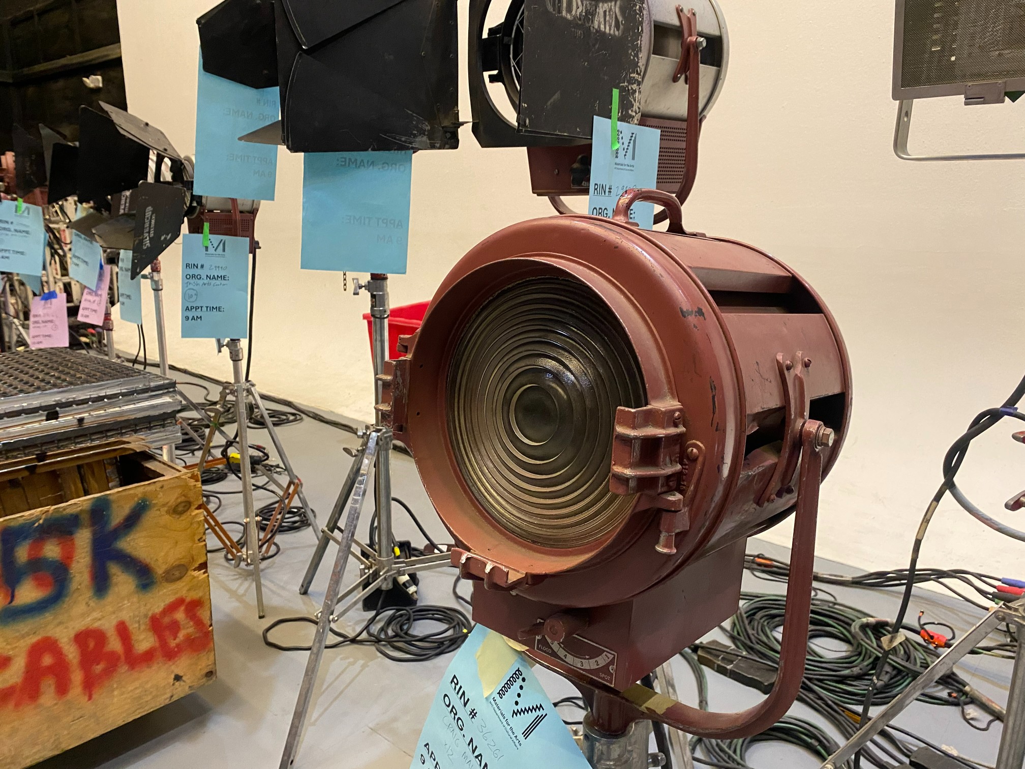 A closeup of Silvercup lighting equipment tagged with MFTA's logo. 
