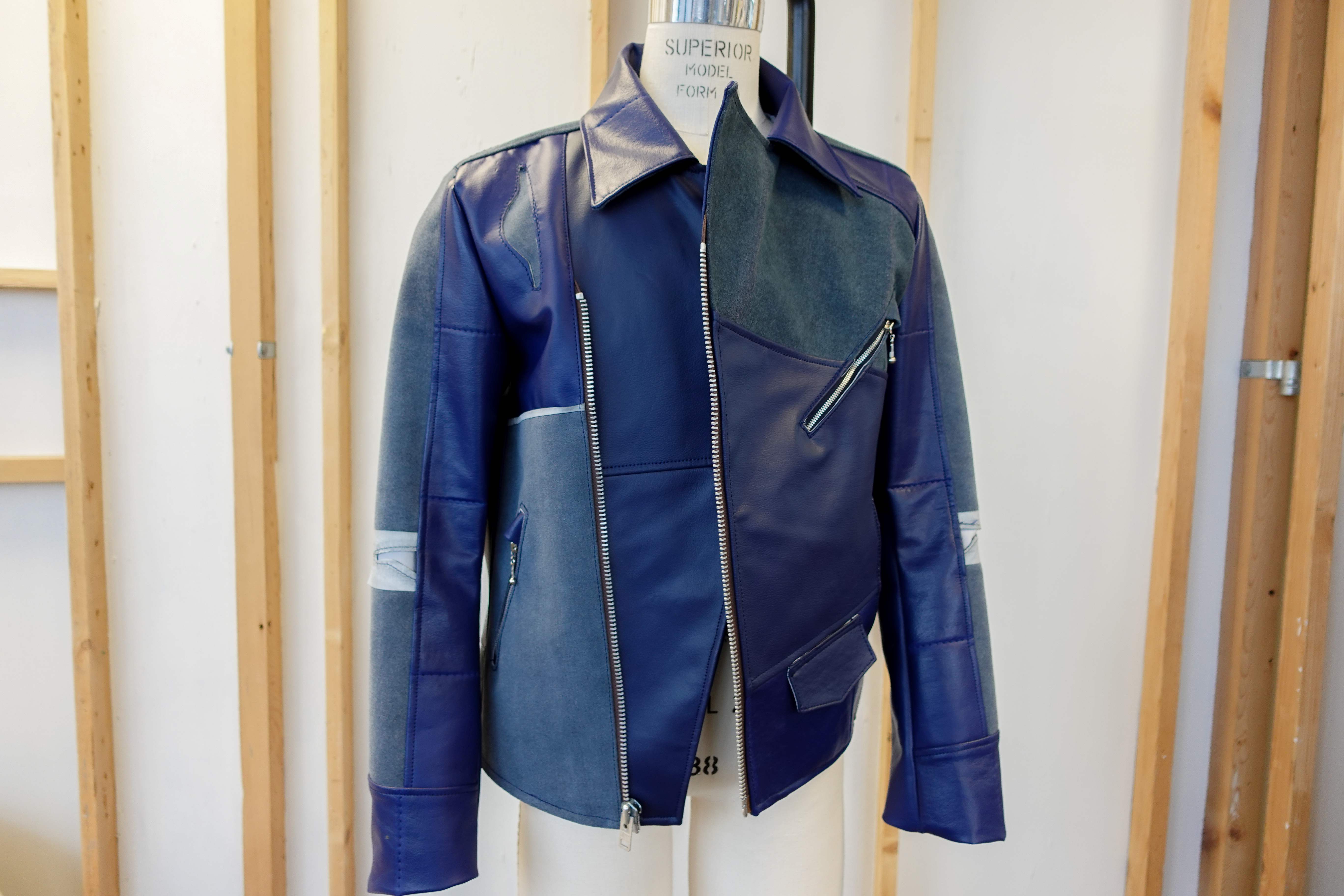 Victor Pearlman's moto jacket made with patches of navy airline seat leather.