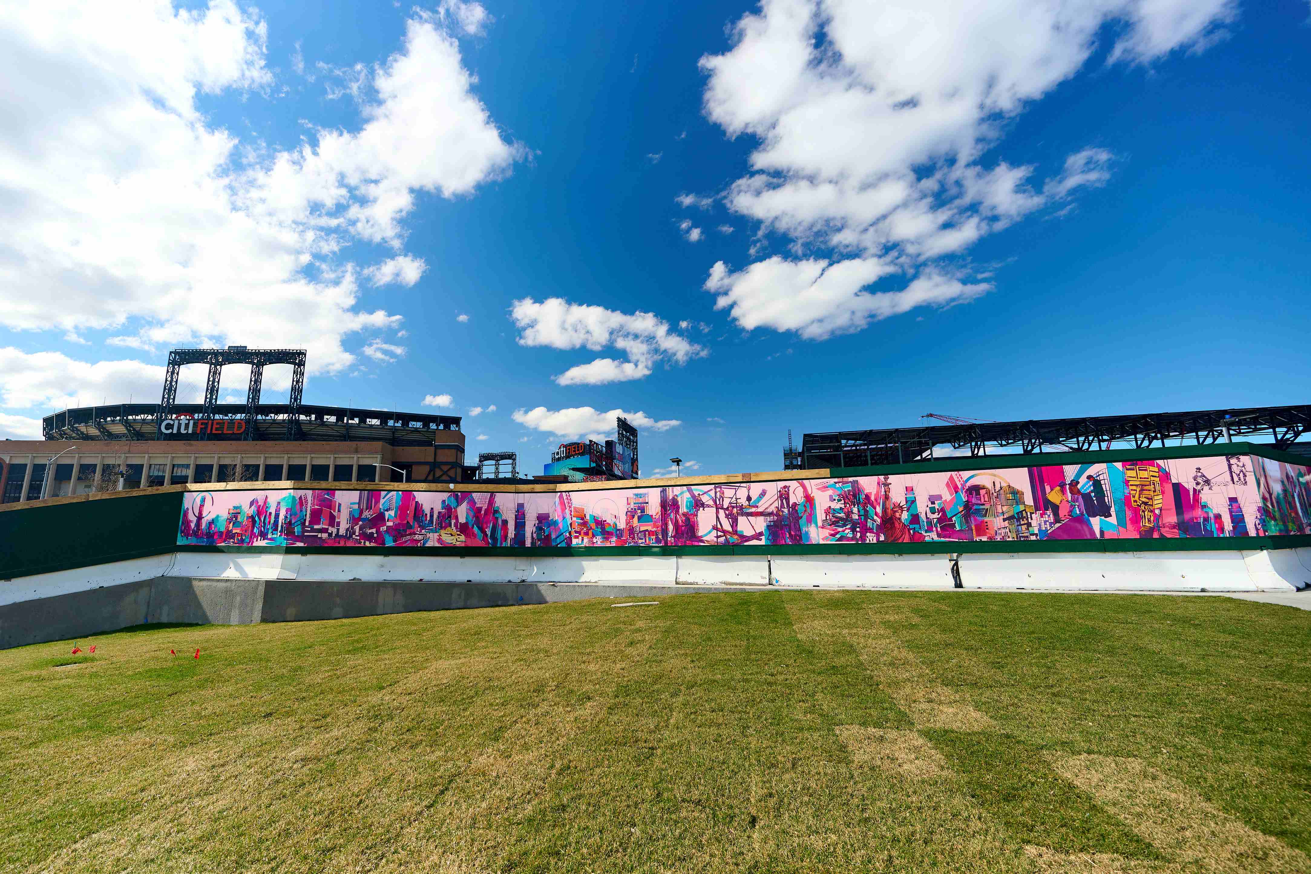 Martinez's colorful installation surrounds construction at Willets Point. 