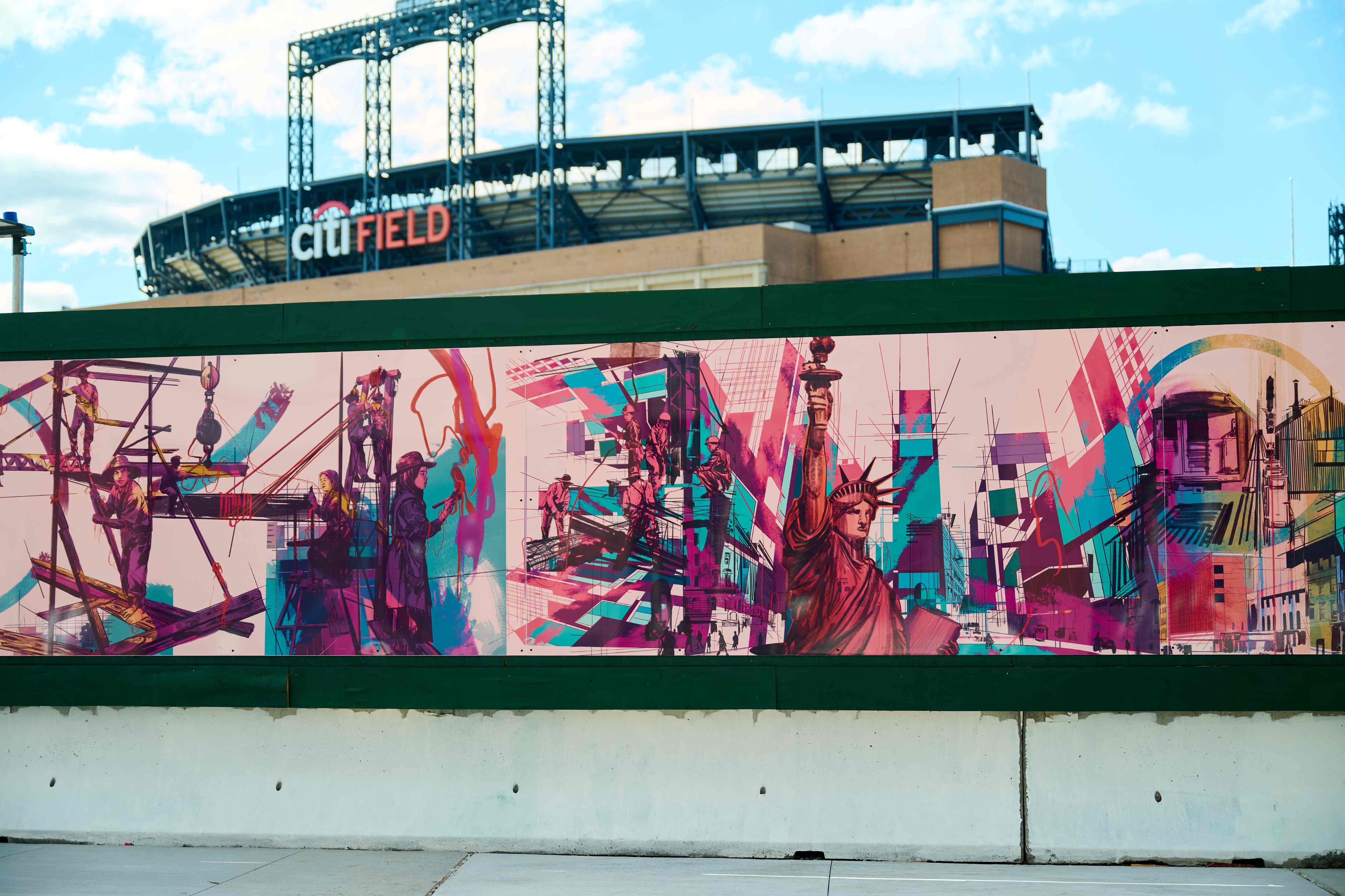 A closeup of the artwork with the Statue of Liberty alongside immigrant workers.