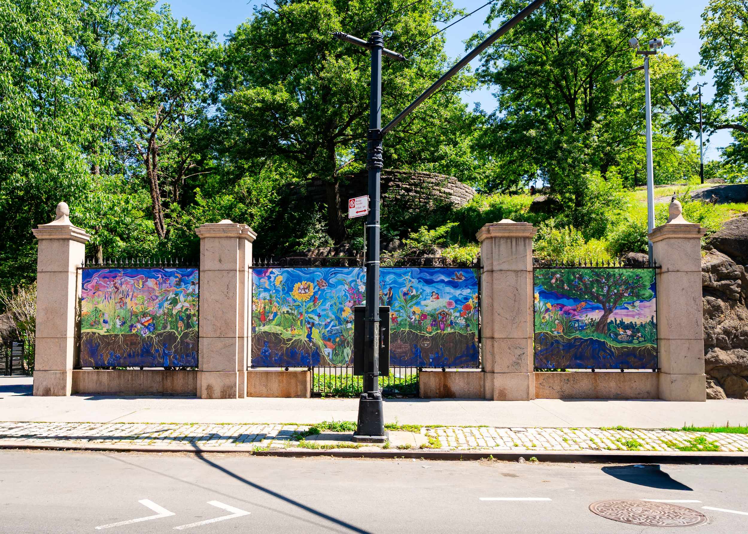The &ldquo;From Root to Bloom&rdquo; installation at the entrance of Marcus Garvey Park. 