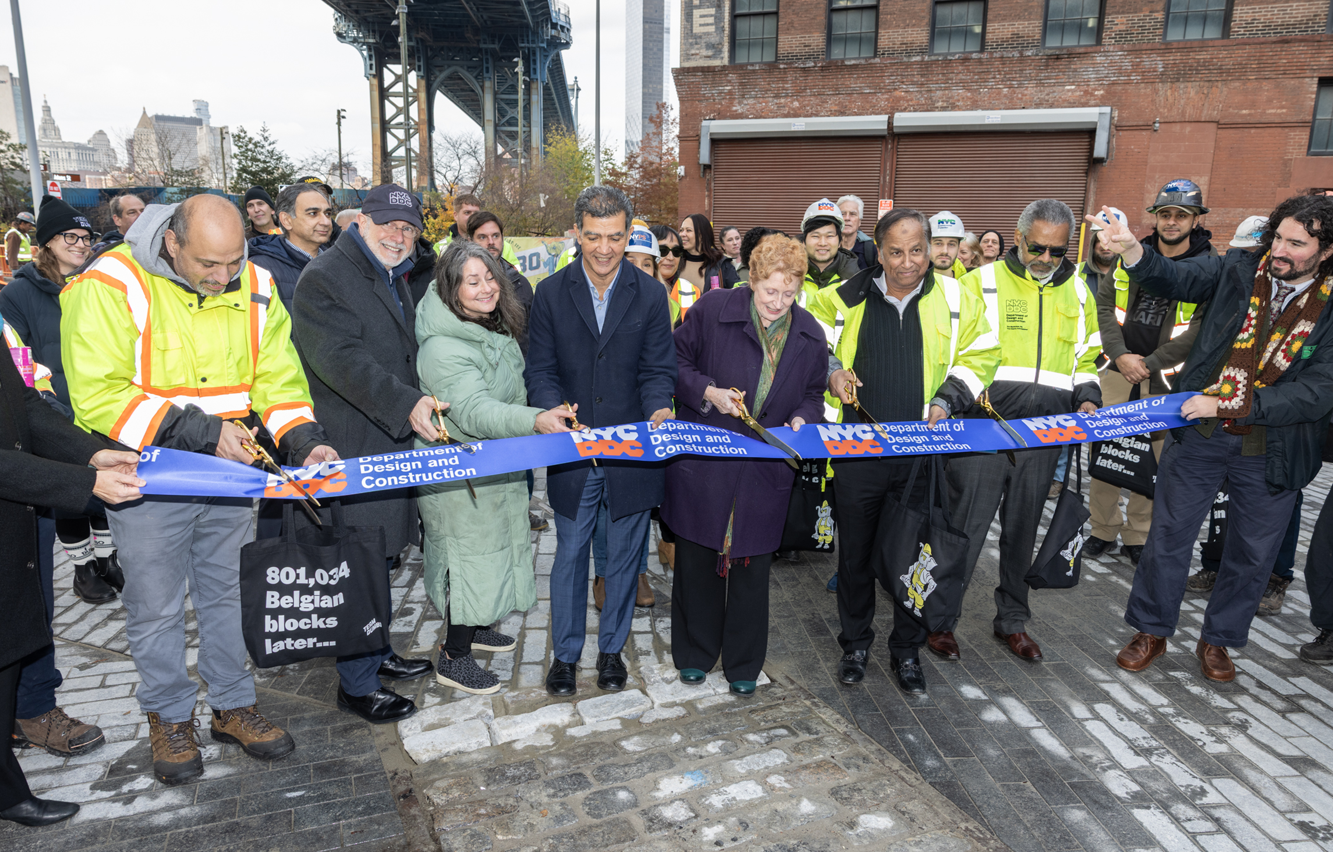 City officials and community members cut the ribbon to celebrate the new infrastructure upgrades
                                           