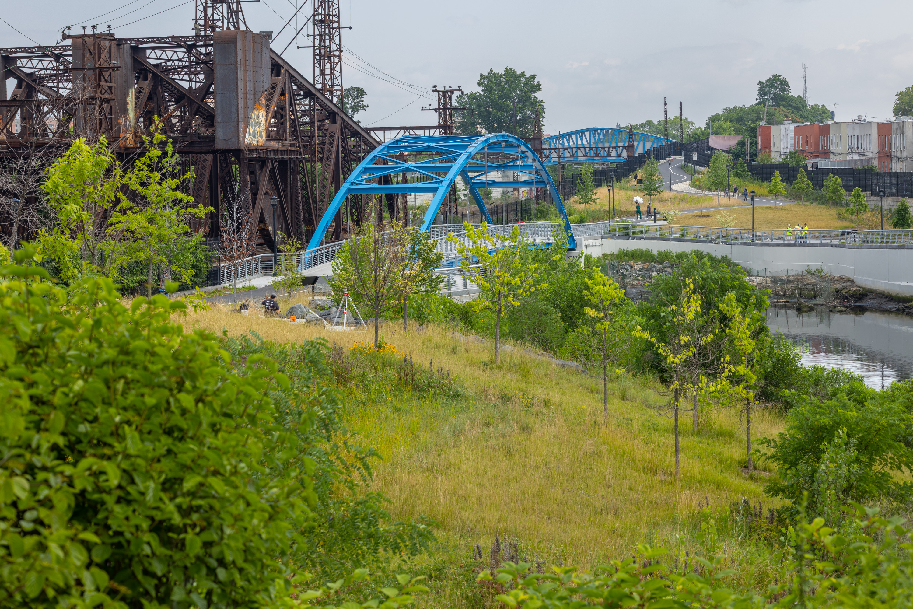 Greenspace and a pedestrian bridge