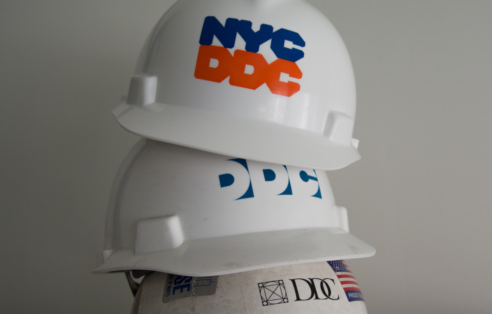 Stack of DDC hard hats