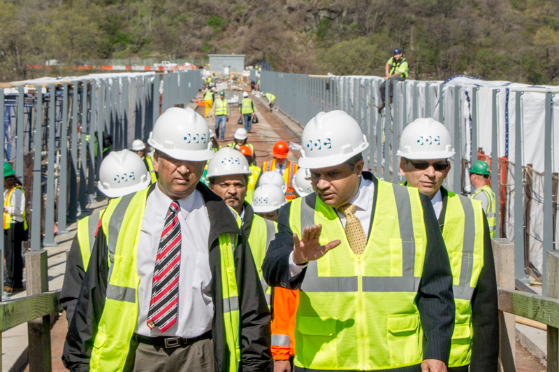 Commisioner Peña-Mora (right) is reviews construction on the High Bridge.
