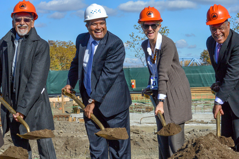 Commissioner Peña-Mora and others breaking ground.