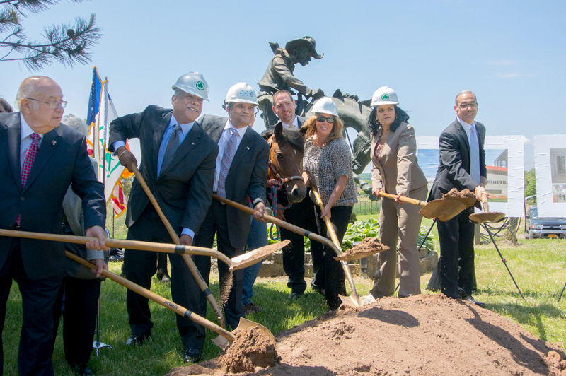 Commissioner Peña-Mora and community leaders break ground.