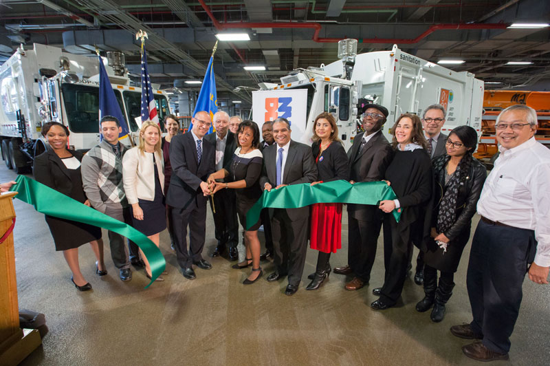 Officials cut the ribbon at the new Manhattan Districts 1, 2, and 5 Garage.