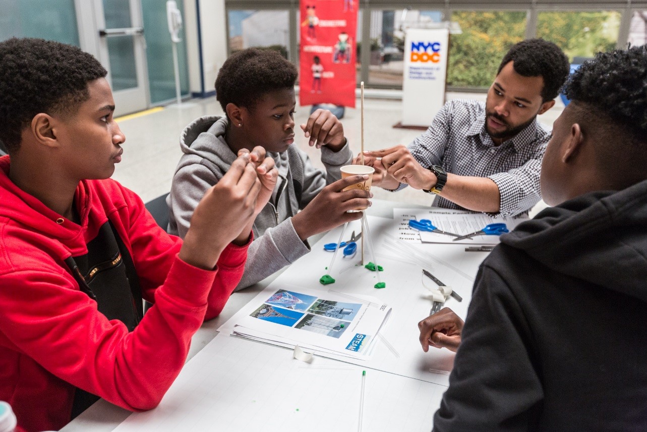 tudents work together with STEAM educator Anthony Martin