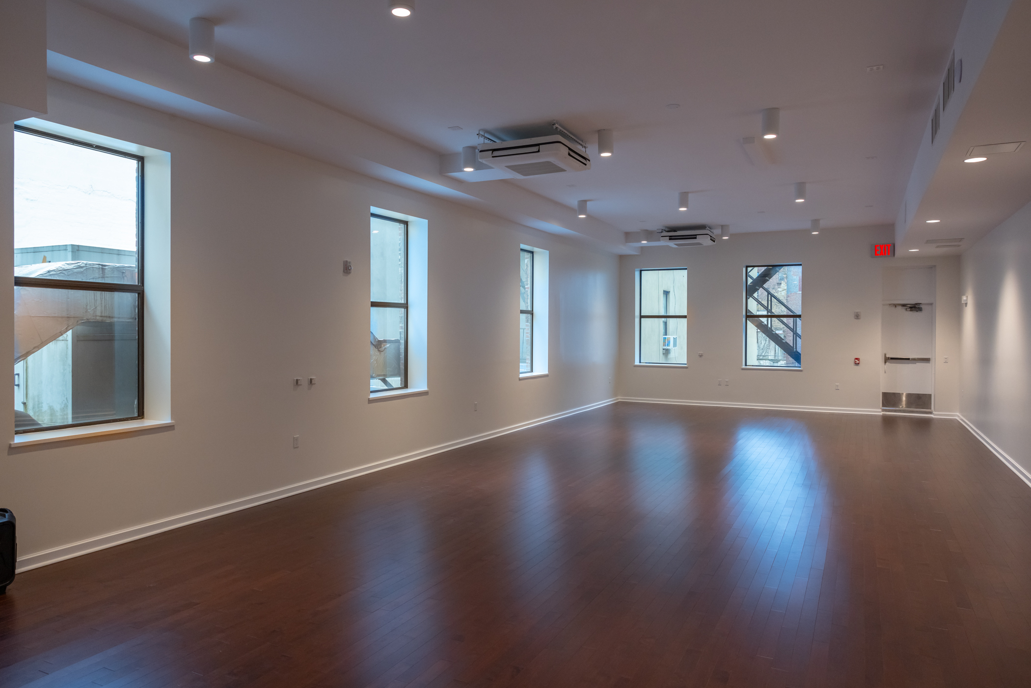 a room inside a building without furniture