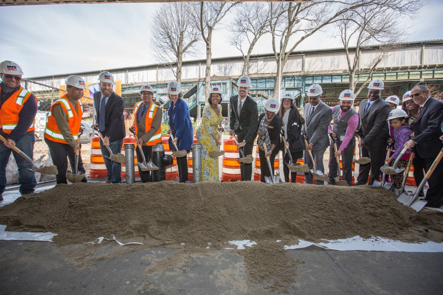 city officials joined for the Corona Plaza groundbreaking