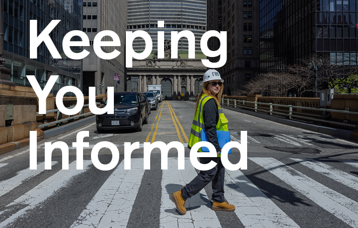 community construction liaison walking across a street