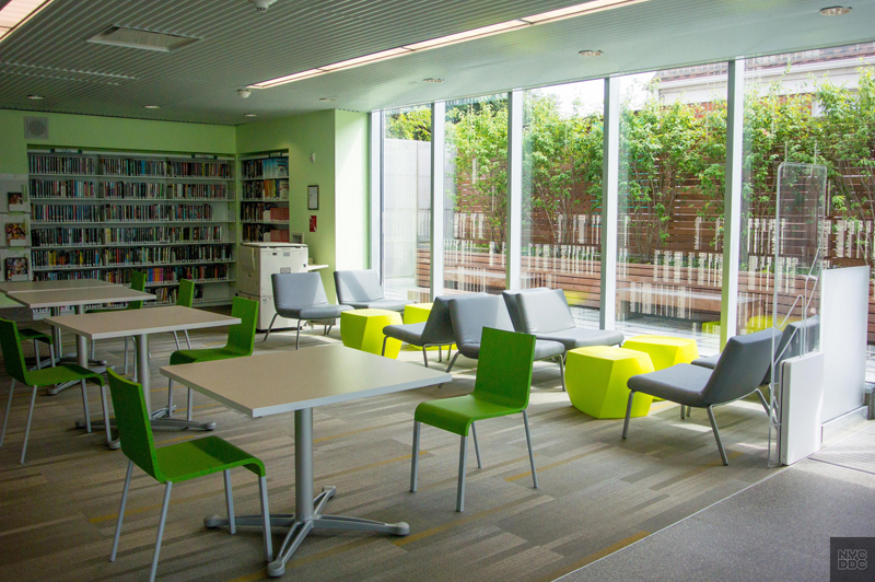 Inside the Glen Oaks Library, tables and chairs make up the teen study area.