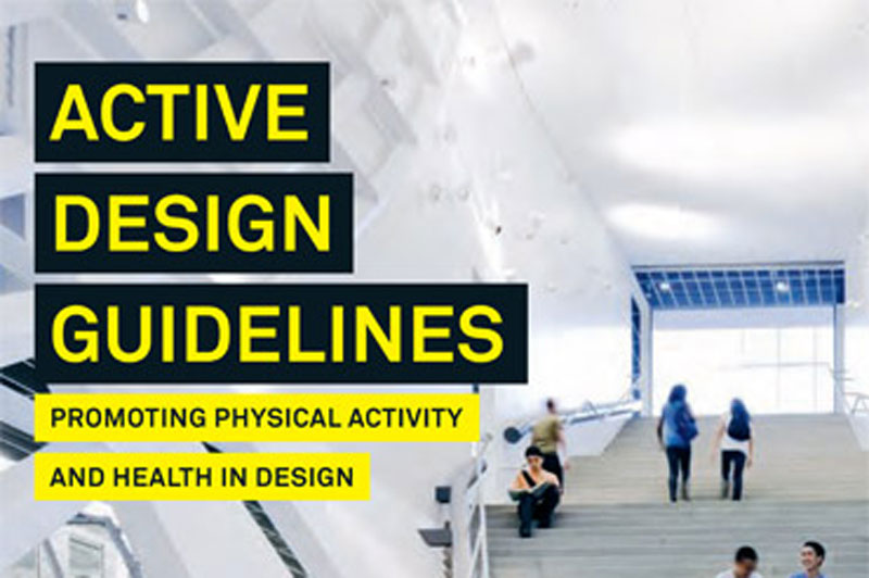 Cover for the Active Design Guidelines. People are walking up and down a wide stairway.