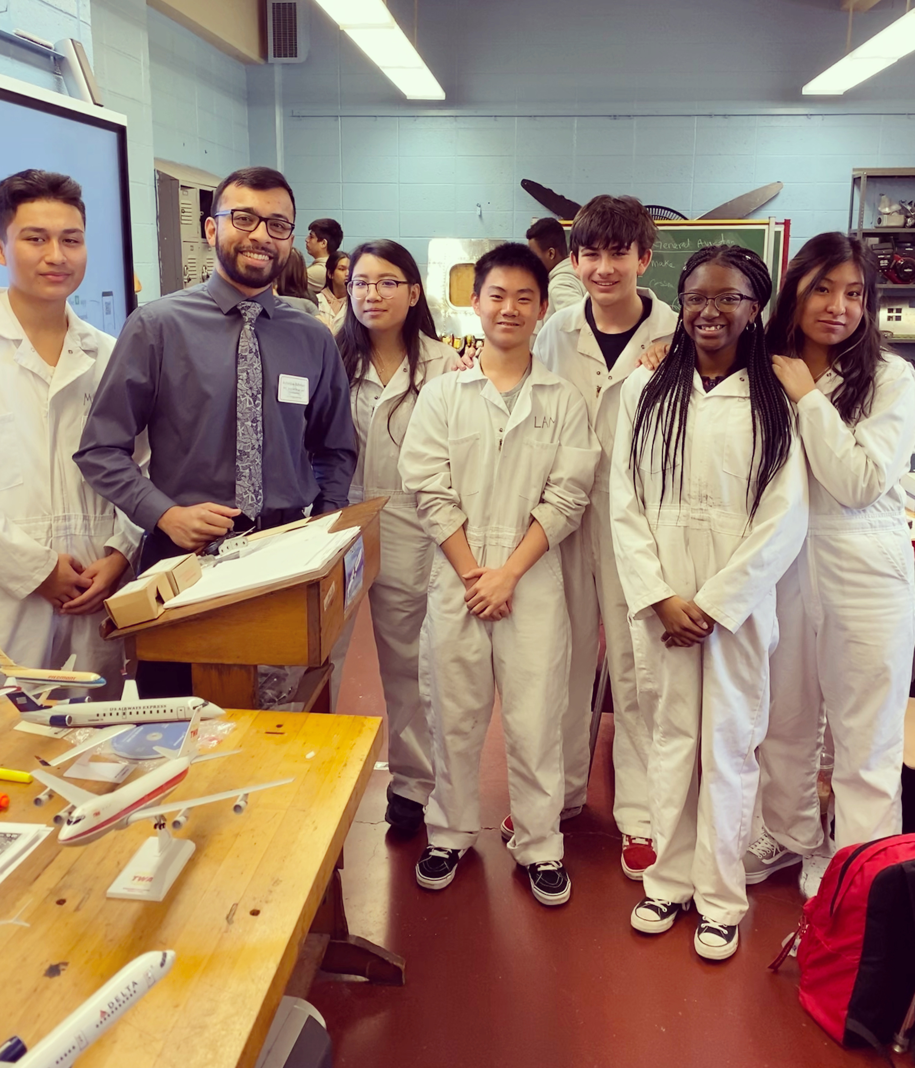 A group photo of students from Aviation High School and DDC's Asheque Rahman