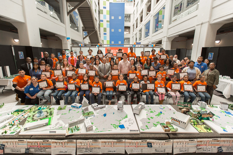 Children and DDC staff gather for a photo at the end of Take Our Children to Work Day. 