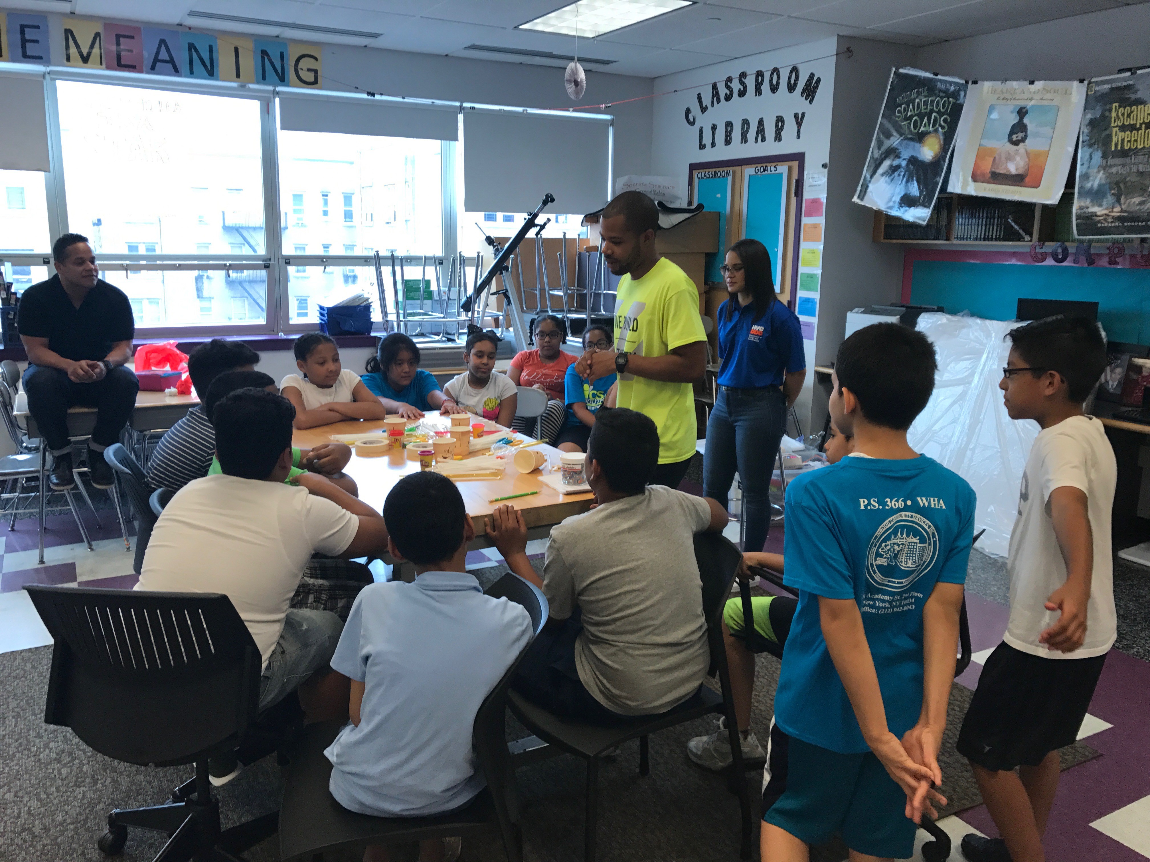 STEAM Team member checks in with the class.