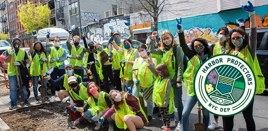 harbor protectors stand in front of a rain garden