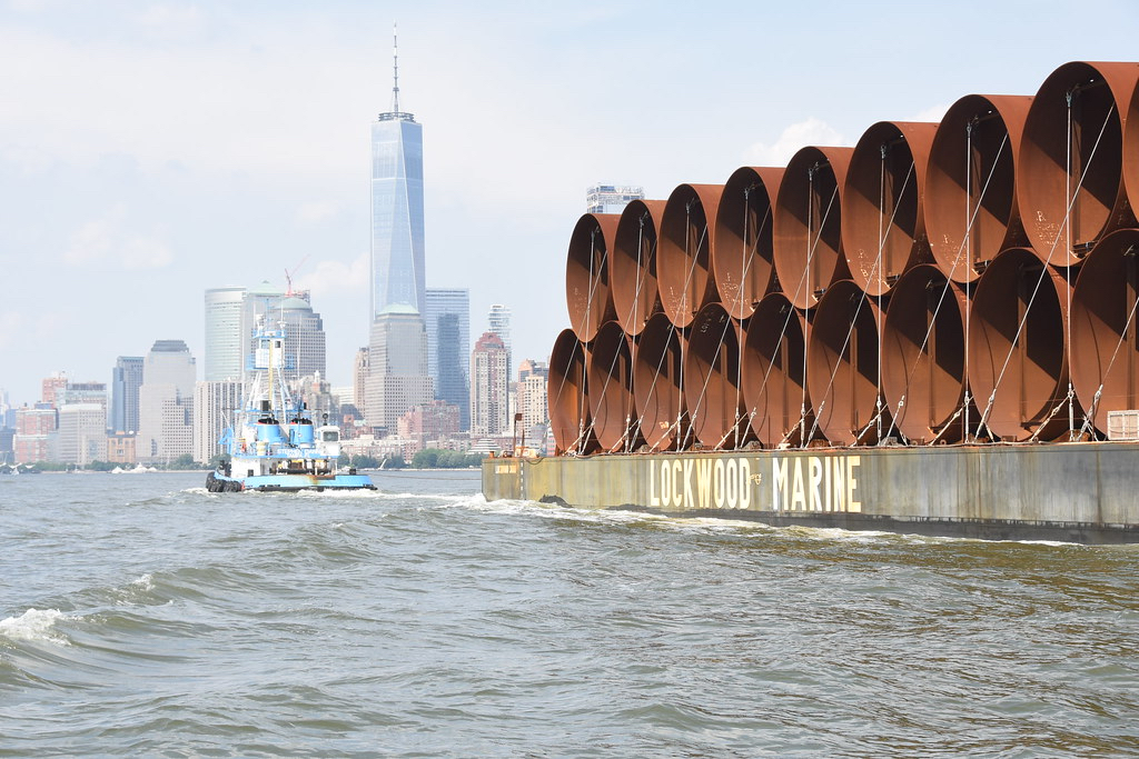 Steel liners arriving by boat in NY Harbor
