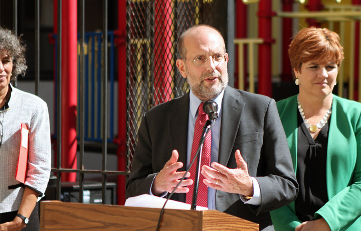 Commissioner Banks and Win CEO Chris Quinn Graphic