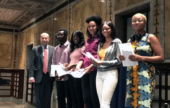 NYC Department of Social Services Commissioner Steven Banks with a group of homeless college-bound high school graduates