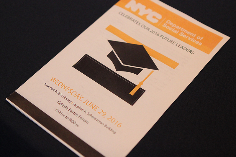 Event program with graduation cap image on cover
