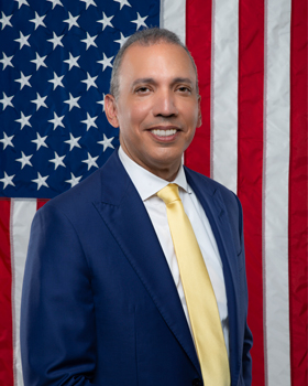 Louis A. Molina - Commissioner