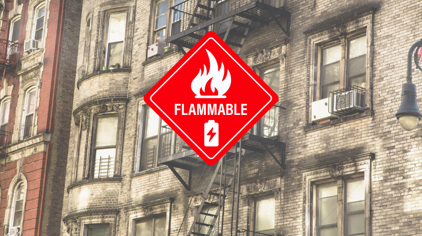 Flammable warning sign over image of an NYC building
                                           