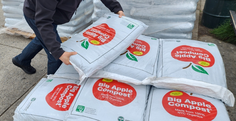 A pile of 40 pound bags of Big Apple compost made from food scraps and plant waste collected by DSNY.
                                           