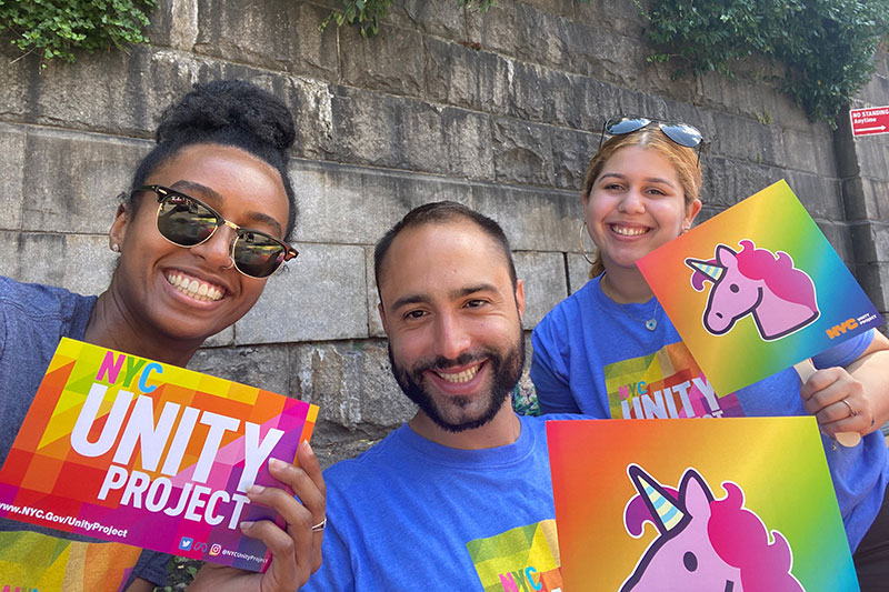 MOE staffers Dabash Negash, Ronald Porcelli and Aura Jimenez enjoying Harlem Pride.