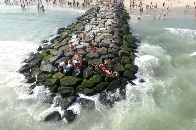 On July 16, 2025, the FDNY and the FDNY Foundation released the latest FDNY Pro Podcast, Episode 116. In it, two FDNY EMTs discuss rescuing five people who got caught up in large swells and a rip current, slamming into the Beach 91 jetty during the Fourth of July weekend in 2024.
                                           