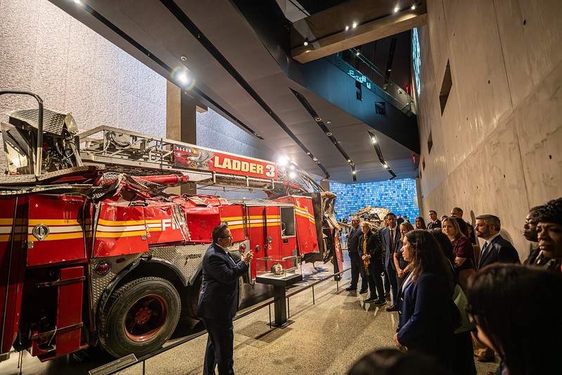 FDNY Commissioner Lillian Bonsignore helps lead a tour through the 9/11 Memorial & Museum.
                                           