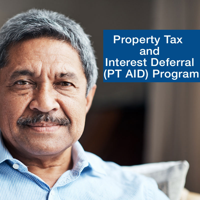 Photo of senior African American or Latino male in a blue shirt