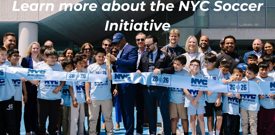 Mayor Eric Adams, Councilmember Francisco Moya, a group of adults, and children stand together at a ribbon-cutting ceremony at PS 211, holding a banner that reads “NYC Soccer Initiative.” Learn more about the NYC Soccer Initiative. 
                                           