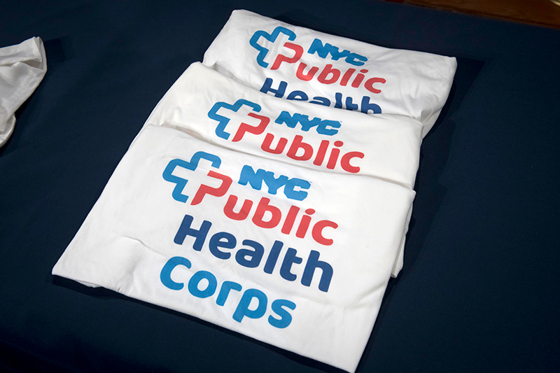3 t-shirts with text reading NYC Public Health Corps