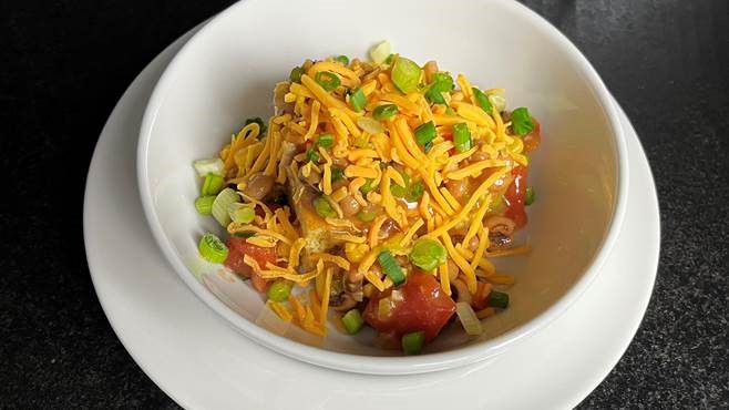 NYC H+H Plant Based Dish: Southern Black-eye Pea Casserole with Plant Based Corn Bread topped with Plant Based Shredded Cheese