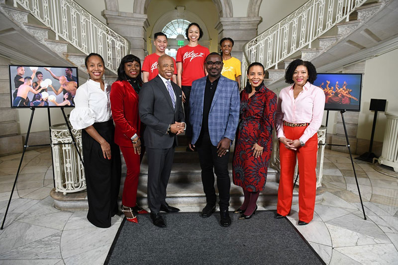 a group photo of Mayor Adams and Ailey Moves NYC performan crews