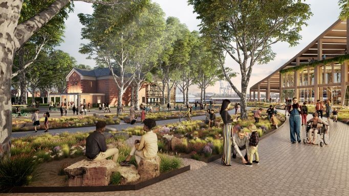 View across a new public space along Division Road, looking toward the renovated historic theater. Credit: Skidmore, Owings & Merrill