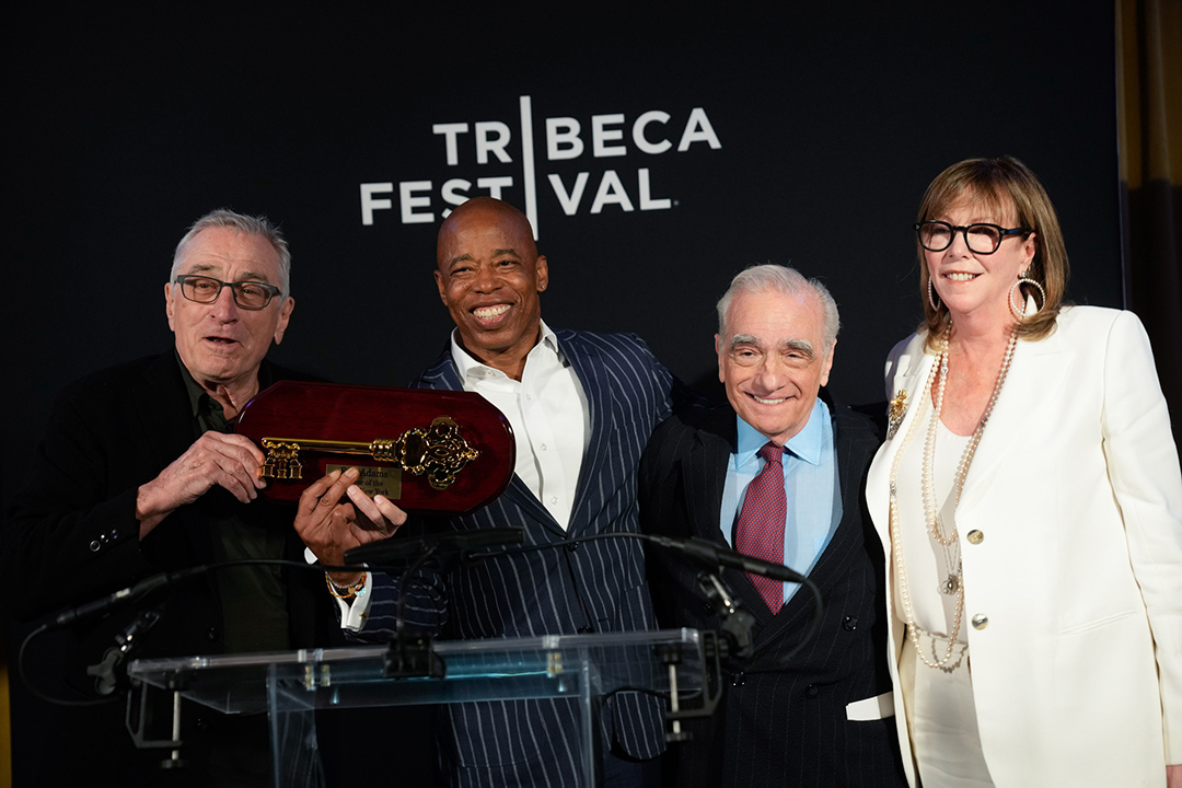 Robert De Niro and Mayor Eric Adams holding the key to the city, with Martin Scorsese, and Jane Rosenthal standing next to them