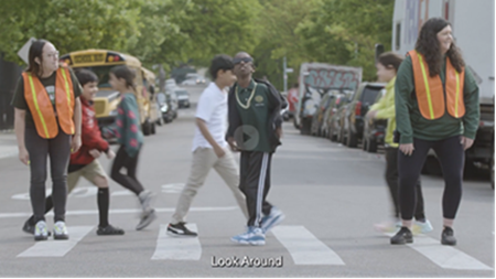 people standing in the crosswalks