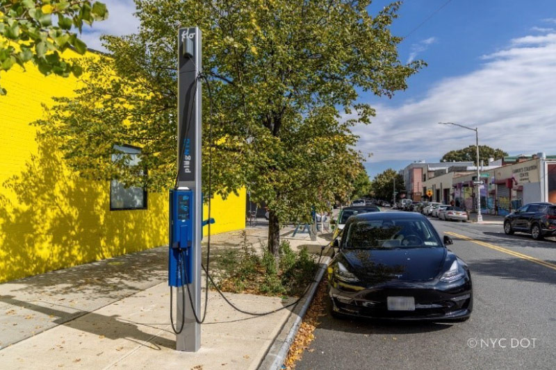 a car is charging at Curbside EV Charger