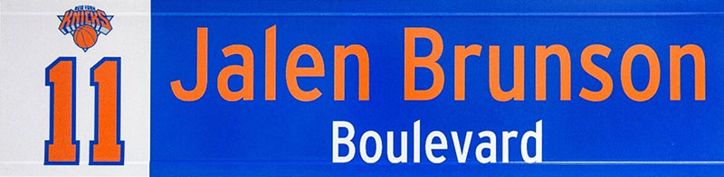 Close up of street sign reading Jalen Brunson Boulevard