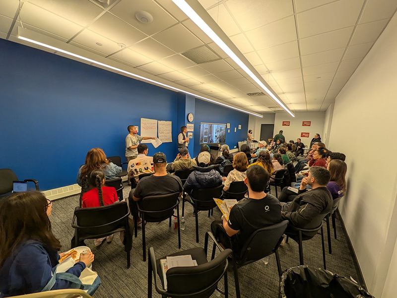 Tenant organizers from Community Voices Heard hold a meeting with tenants