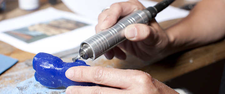 Artisan working on a carving