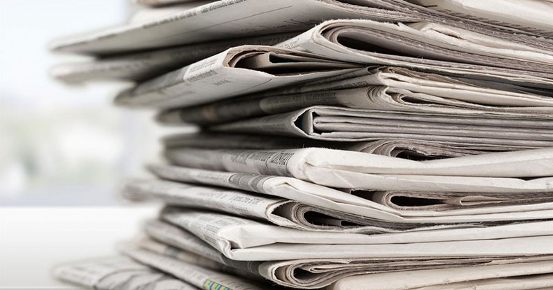 a stack of newspapers