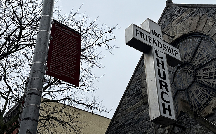 photo of historic district marker and signage reading: The Friendship Church